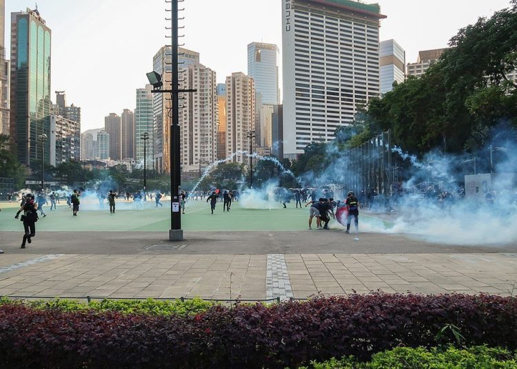 Police release tear gas in Victoria Park, Hong Kong, Police release tear gas in Victoria Park, Hong Kong Wpcpey / CC BY (https://creativecommons.org/licenses/by/4.0)