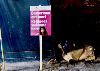 Placard saying "Braverman out now! Refugees welcome here"