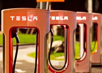 Photo of a row of Tesla charging stations