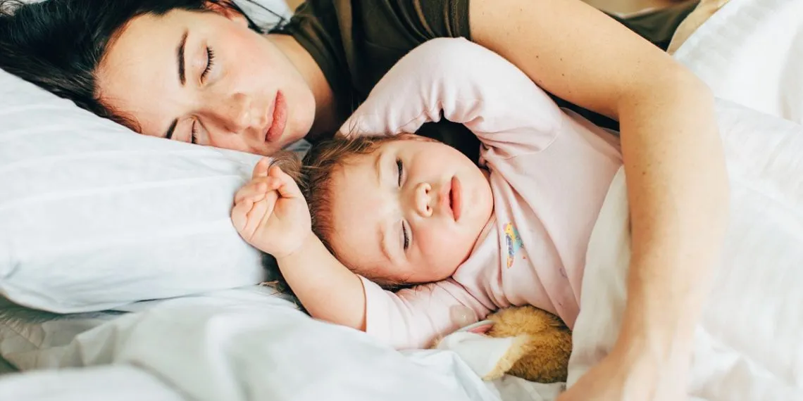 Image of a mother and baby sleeping
