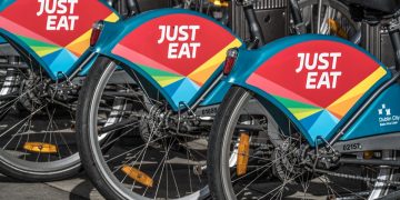 Close up of wheels of Just Eat rental bikes