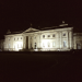 a grand old building lit up at night