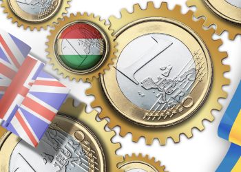 euro coins laid out like cogs with British, Hungarian and Ukraine flags around them