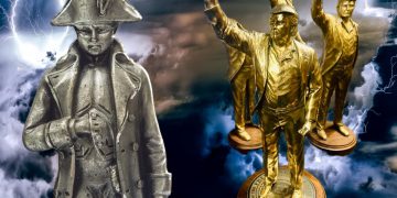 a small silver statue of a soldier looking down and golden statues of four men with their arms raised on a stormy background