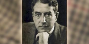 an old black and white photo of a silent movie star against a blurry background