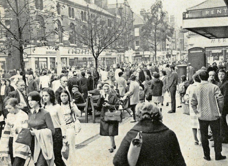 Black and white image of a shopping street in Castleford in the 1960s