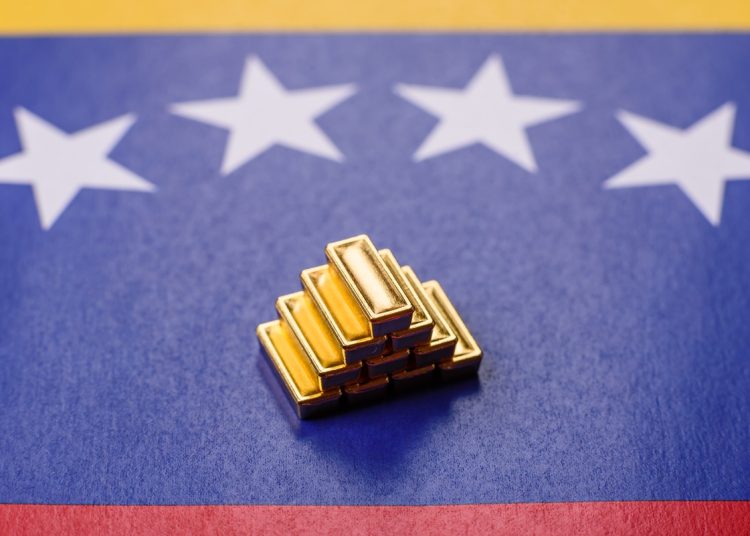 Gold bars or ingots as a tool for balance, financial investment, and savings. Backdrop of Venezuelan flag.